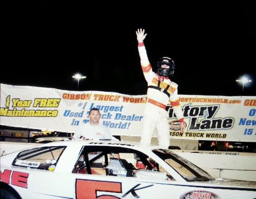 Daniel Keene,  Jr. waves to the crowd after winning the 50-lap Pro Late Model race Saturday night...